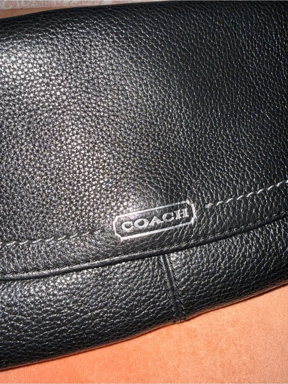Black leather coach wristlet
